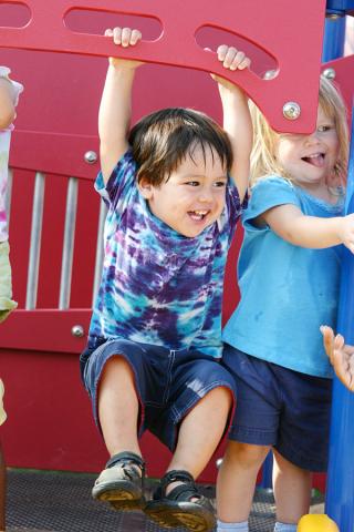 boy playing on playground