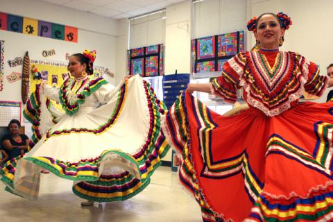 cultural folklore dancing with bright colorful dresses