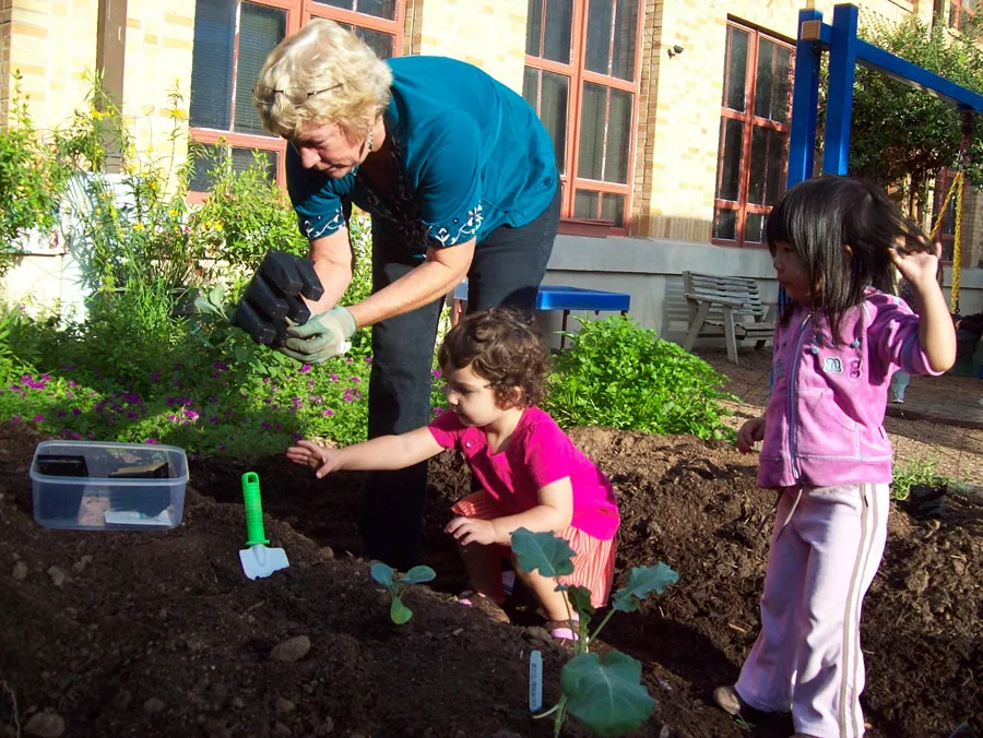 Sandy planting with kids